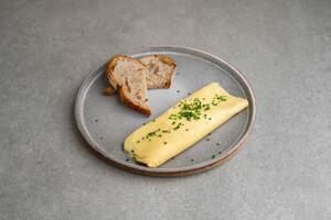 Drivu Filled Omelet, Toasted sourdough, Chives (from 8am to 3pm)