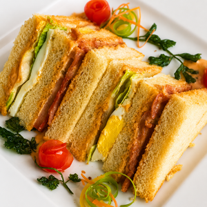 Turkey & Egg Club Sandwich - Cafe Peloton dubai