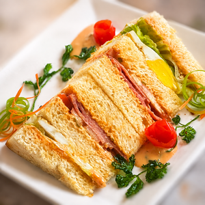 Beef Bacon & Egg Club Sandwich - Cafe Peloton dubai