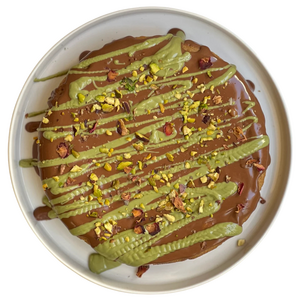 Drivu Kunafa with chocolate and pistachio topping