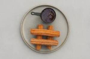 Churros with Gianduja sauce  - The Grey dubai