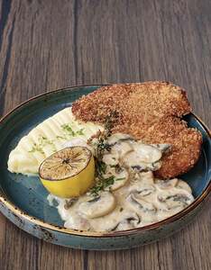 Chicken Schnitzel  - Wolves Cafe sharjah