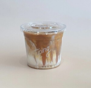 Iced Spanish Cortado - Typing Coffee Shop al-ain