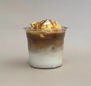 Iced Signature Latte - Typing Coffee Shop al-ain