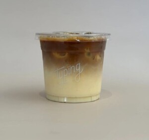 Iced Saffron Latte - Typing Coffee Shop al-ain