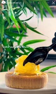 Aseeda With A Scoop Of Saffron Ice Cream - Roots Cafe ajman