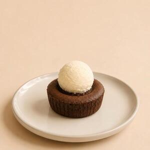 Chocolate Foundant With A Scoop Of Vanilla Ice Cream - Roots Cafe ajman