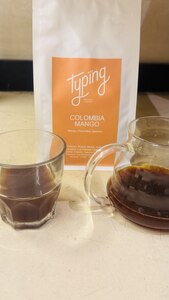 Hot V60 Colombia Mango - Typing Coffee Shop al-ain