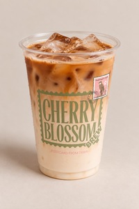 Iced Hazelnut Latte - Cherry Blossom Brew dubai