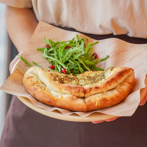 Three Cheese Zaatar Manakish - Two Neighbors dubai
