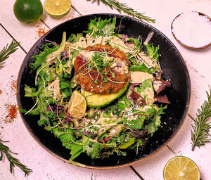 Drivu Crab cake, avocado, roasted sesame leaf salad.